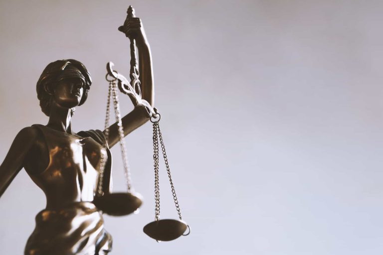 lady justice or justitia statue with blindfold and scales is a symbol for law and legal concepts